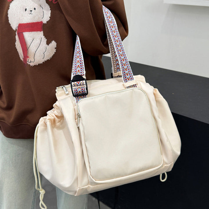Interior view of women's large capacity tote backpack, showing organization