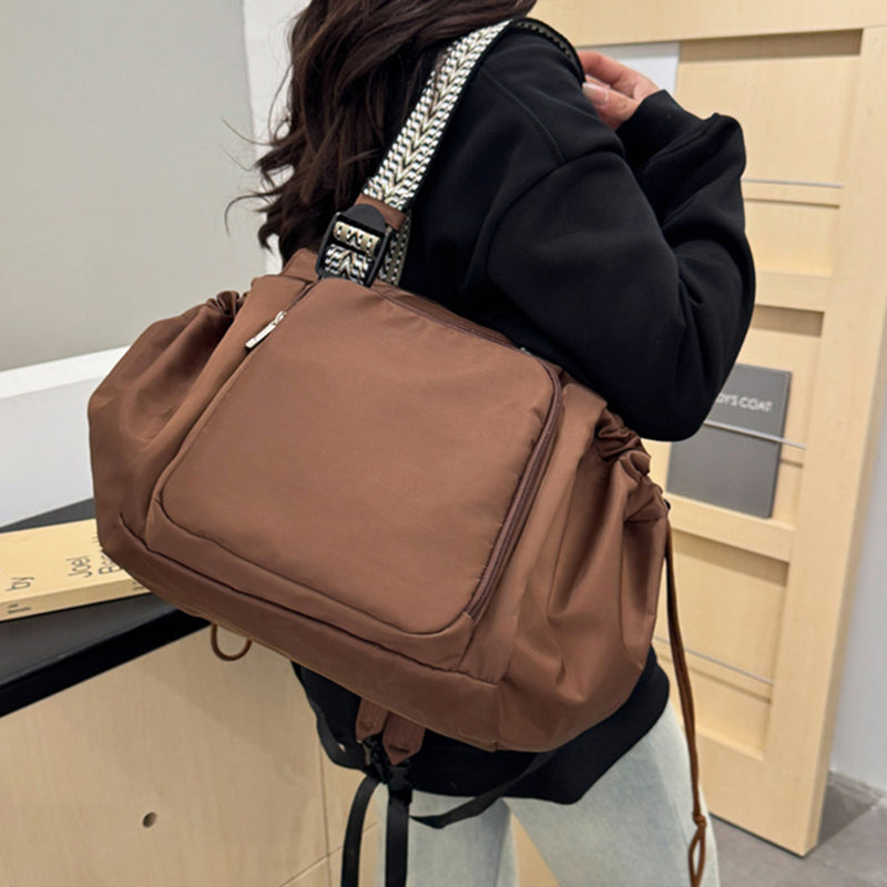 Convertible women's bag functioning as a tote, black nylon and spacious