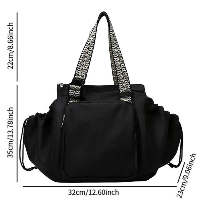 Stylish and practical women's diaper bag, black nylon tote backpack design
