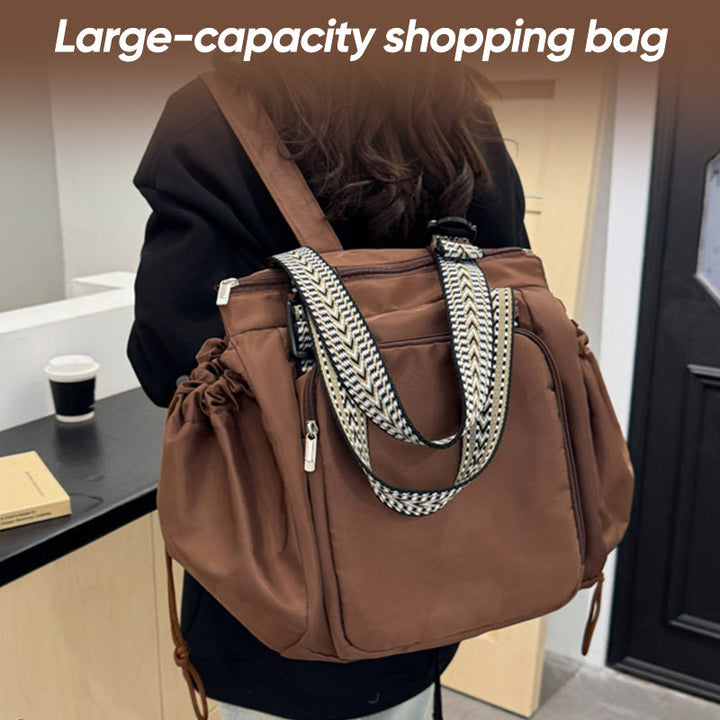 Women's large black nylon tote backpack, perfect as a versatile diaper bag