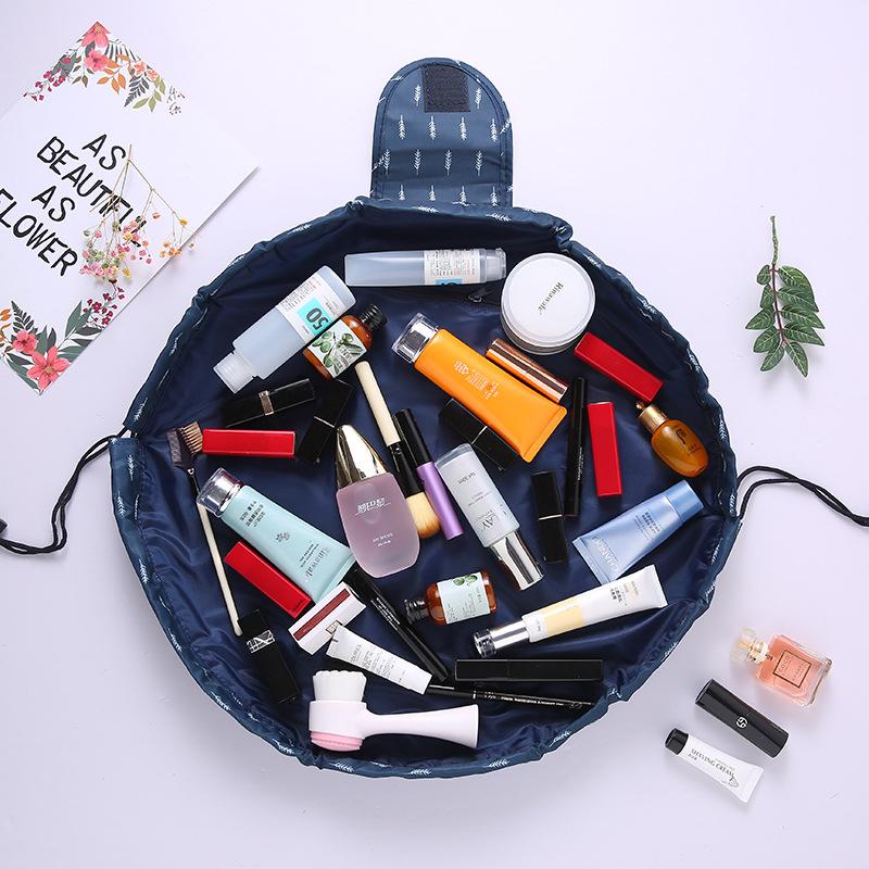 Lay-flat cosmetic pouch for women, filled with various makeup products, showcasing its large capacity and convenience.