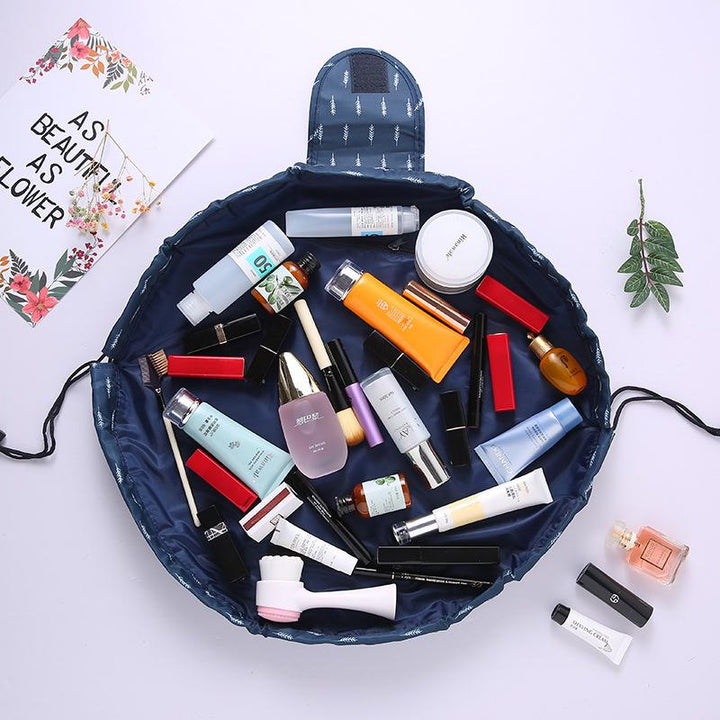 Lay-flat cosmetic pouch for women, filled with various makeup products, showcasing its large capacity and convenience.