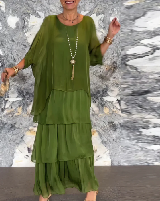 Elegant women's tiered maxi dress, loose fit bohemian A-line gown. Ideal for evening, summer, or vacation wear.