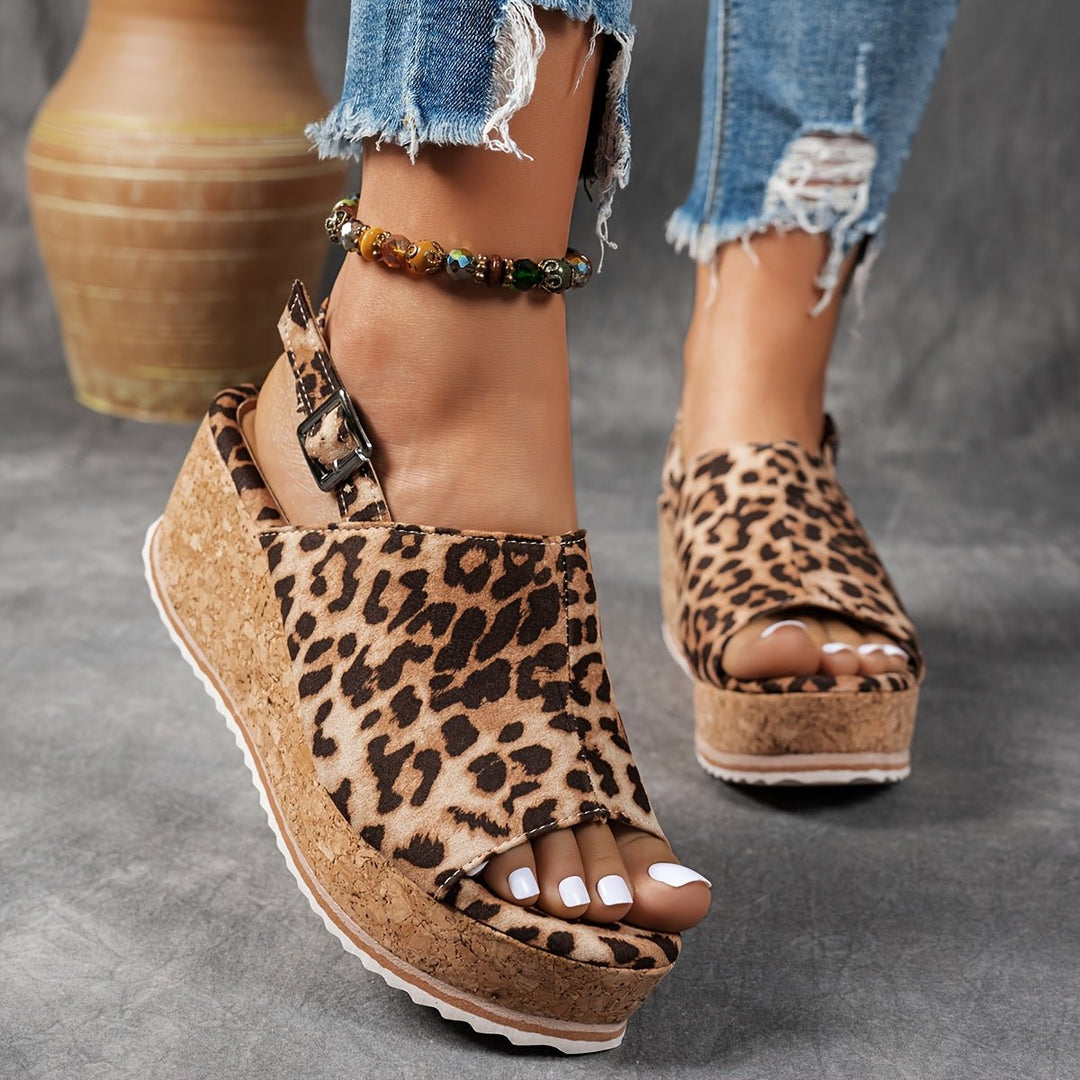 Women's leopard print platform wedge sandals with buckle strap, perfect for comfortable summer casual wear.