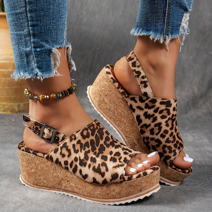 Boho chic leopard print platform wedge sandals for women, open toe, ideal for festivals and summer casual outfits.