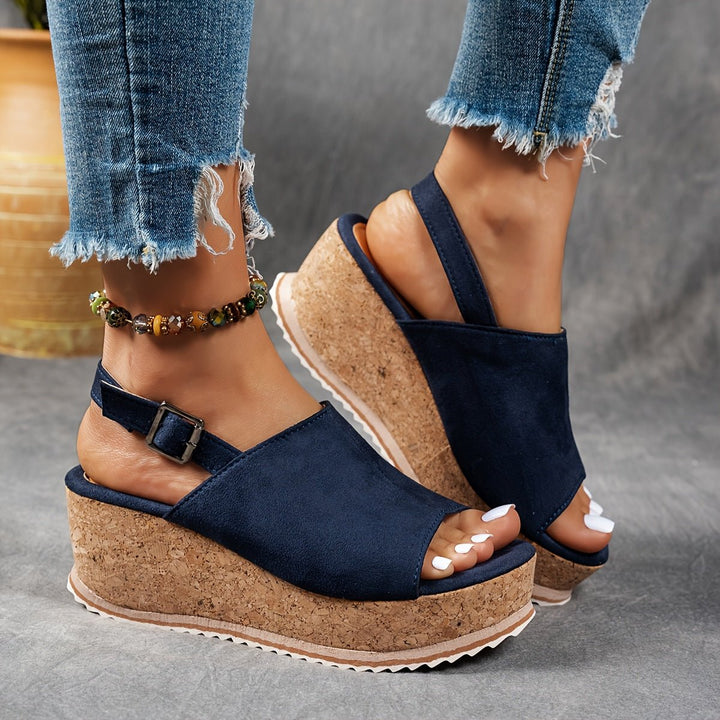 Casual women's leopard print platform wedge sandals, comfortable for festivals, featuring an open toe and secure strap.