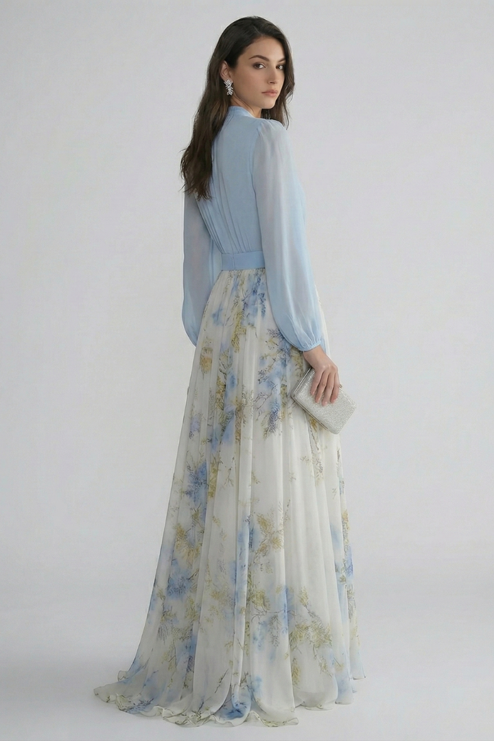 Printed light blue women's long maxi dress, V-neck, and delicate sheer sleeves. Flowing and elegant.