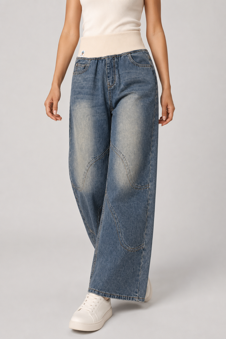 Light blue wide leg jeans for women. Loose fit, high waist denim perfect for comfortable everyday casual wear.