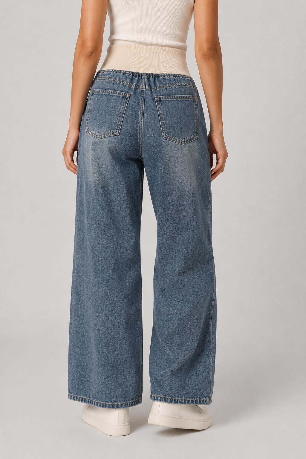 Effortless women's fashion: light blue wide leg loose fit jeans, high waist denim for relaxed, comfortable style.