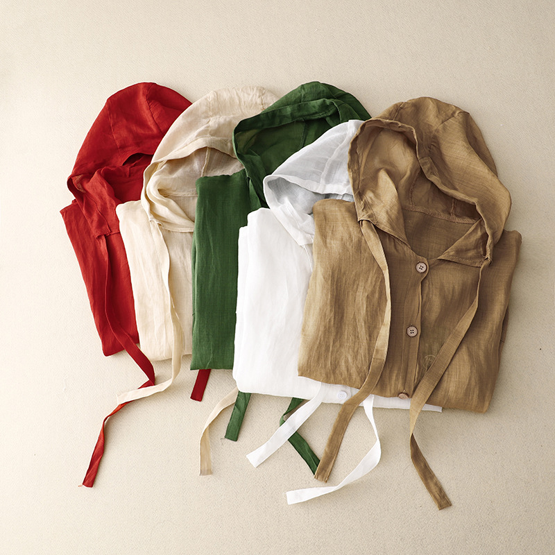 Effortless style with this women's lightweight airy hoodie, featuring a button front and comfortable relaxed fit.