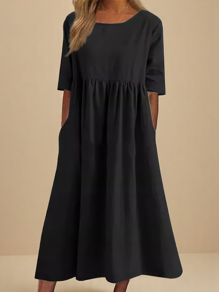 Lightweight & breathable women's flowy summer dress, offering comfort for spring and warm weather travel.