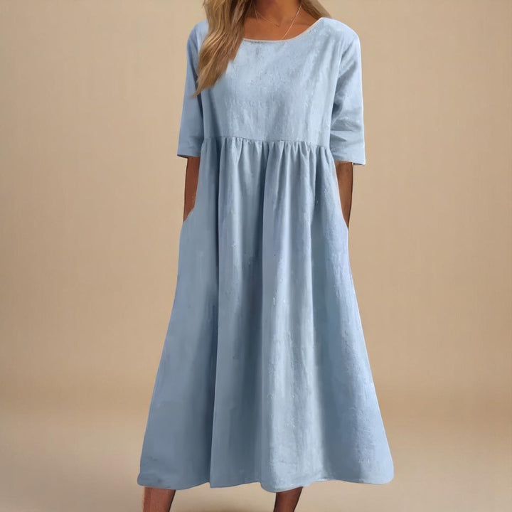 Stylish women's midi summer dress for effortless everyday wear, travel, or a relaxed vacation outfit.