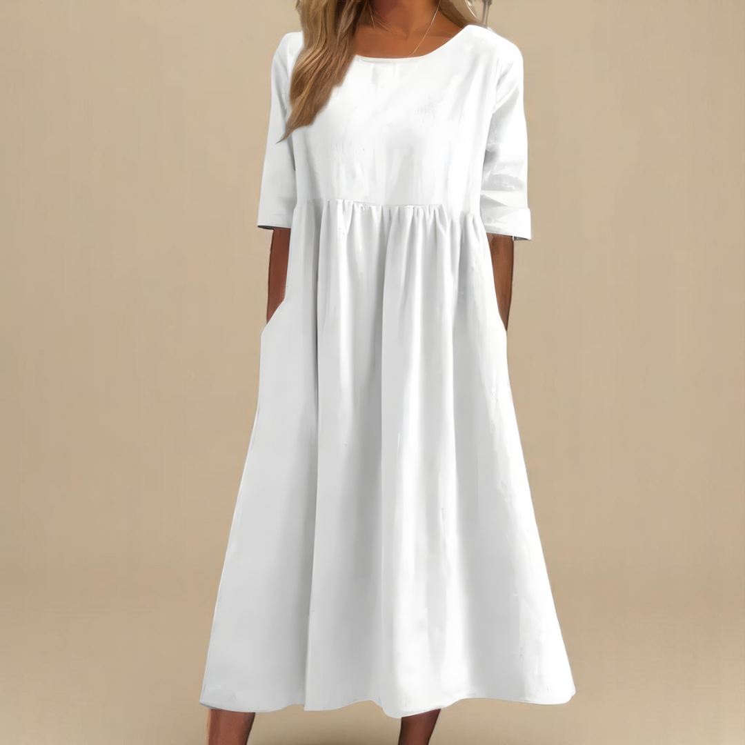Versatile women's flowy summer dress, suitable for casual outings, travel, and comfortable spring fashion.