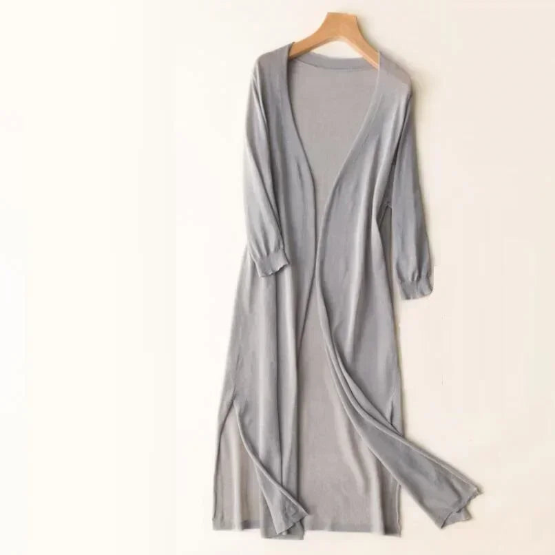 Open front long cardigan for women, featuring chic side slits and 3/4 sleeves. Lightweight & comfy.