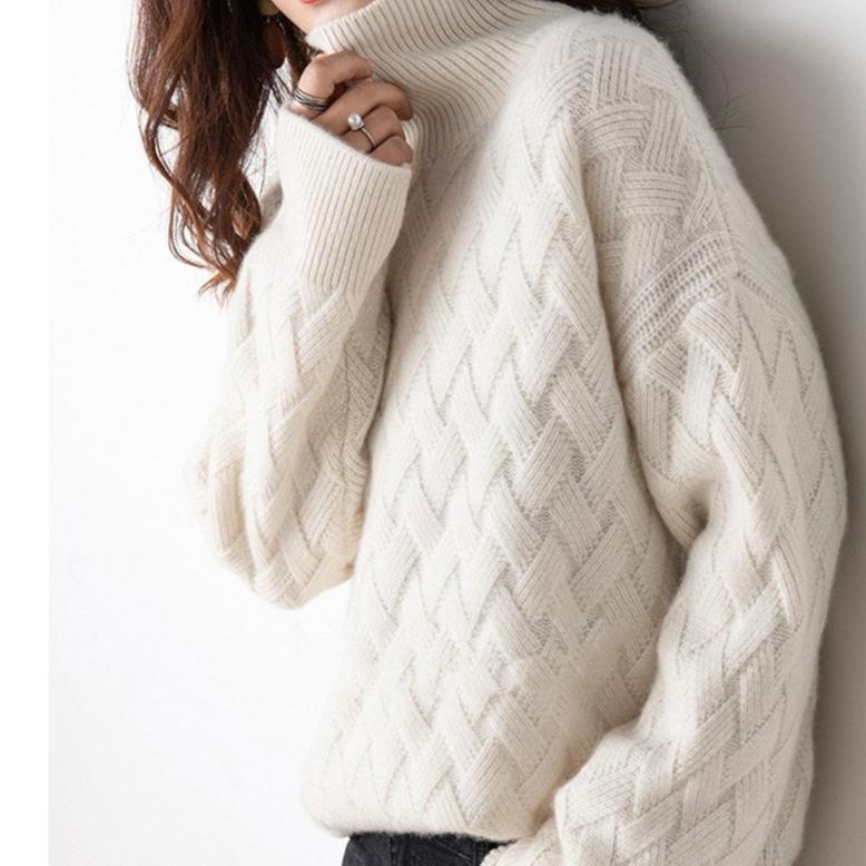 Women's lightweight off-white turtleneck sweater, perfect for spring layering and casual chic outfits.