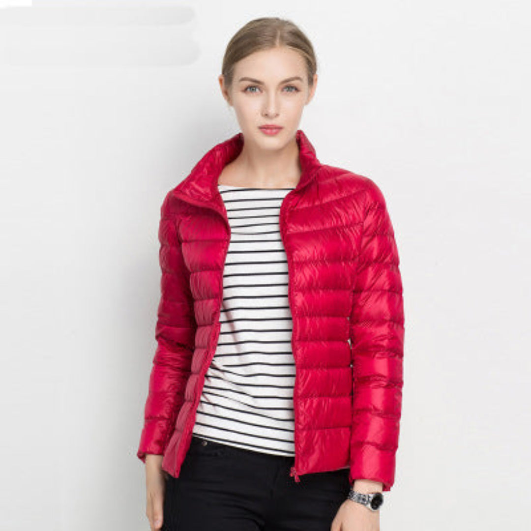 Stylish women's puffer jacket for winter & fall, lightweight & packable design for everyday outerwear.