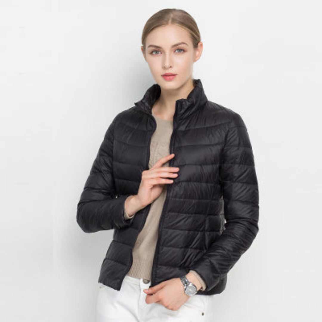 Casual women's quilted puffer jacket, lightweight and packable, great for winter warmth & fall outerwear.