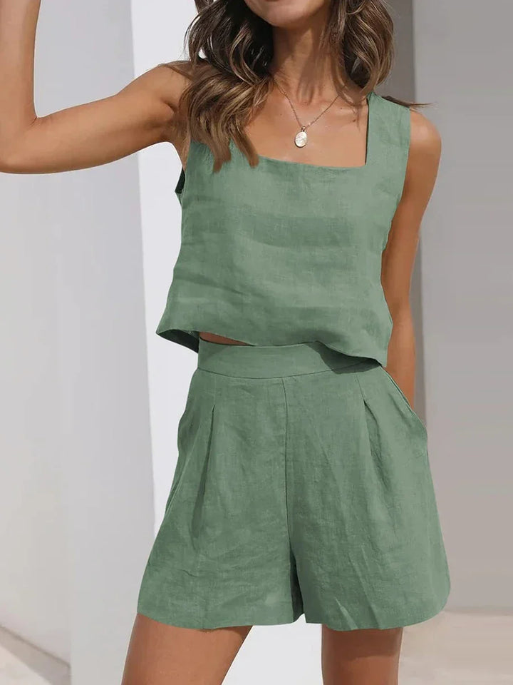 Casual women's sleeveless crop top and shorts matching set, lightweight two-piece for summer beach wear.