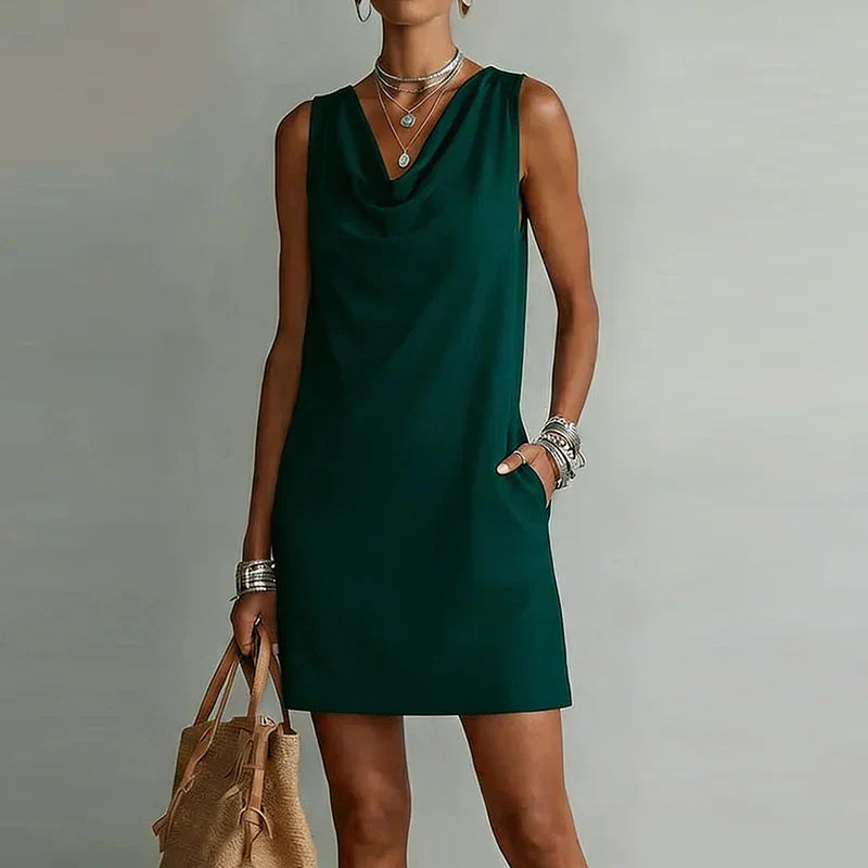 Women's lightweight sleeveless mini dress with pockets, perfect for casual summer wear and effortless style.