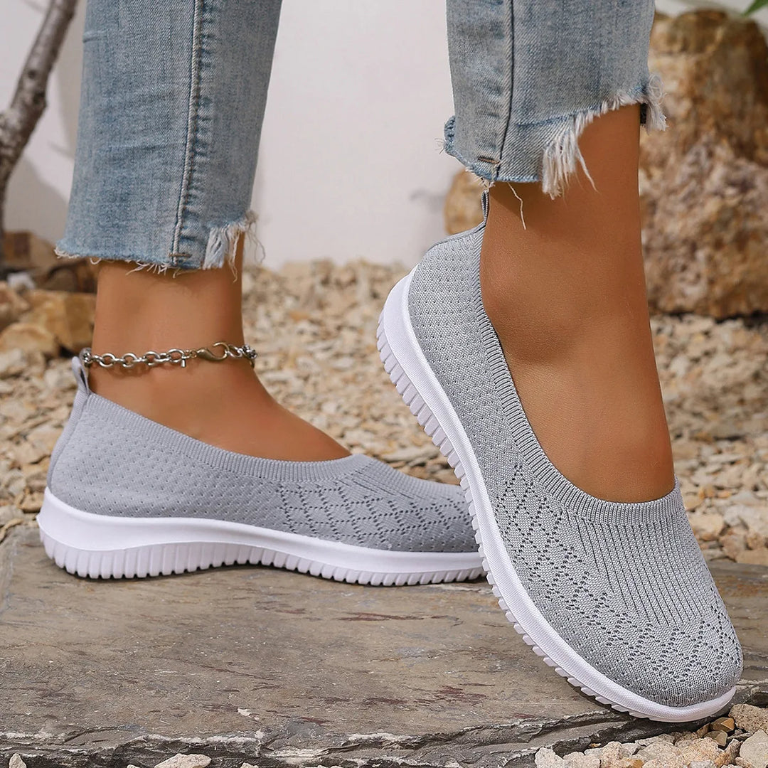 Women's lightweight slip-on walking sneakers with flexible soles. Ideal for all-day comfort & casual wear.