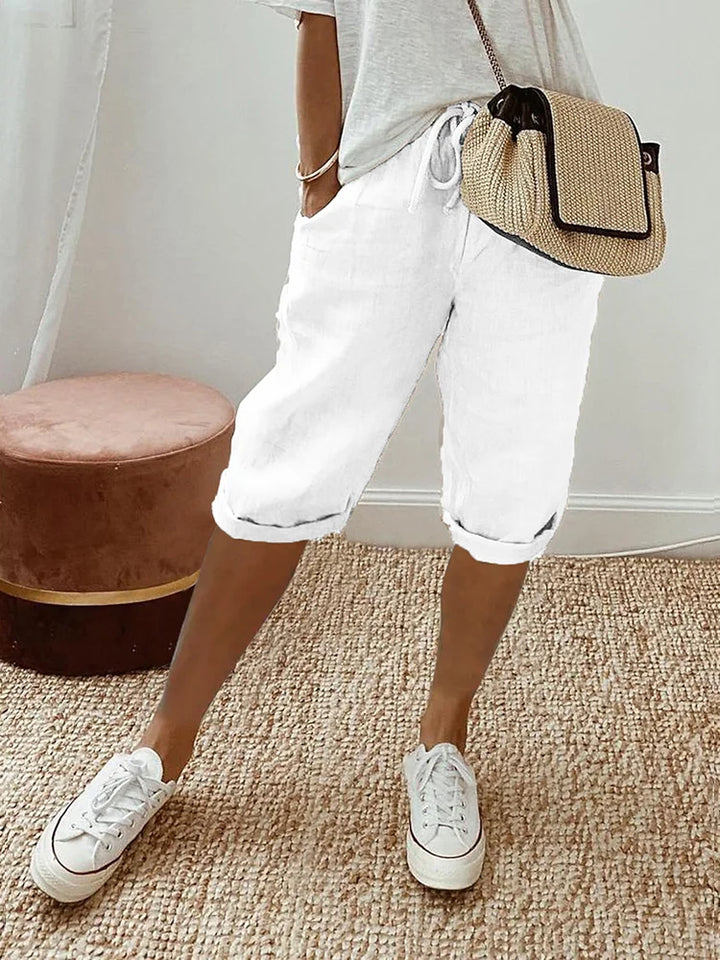 Lightweight women's summer shorts, perfect for warm weather. Features comfortable relaxed fit and drawstring.