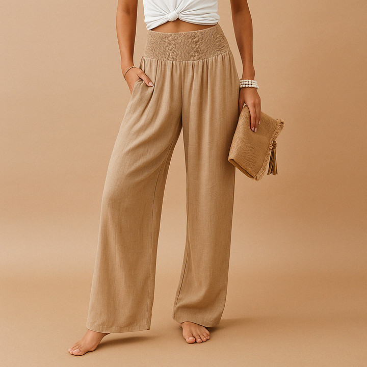 Women's lightweight summer trousers with an elastic waist, loose fit, and breathable fabric, perfect for casual everyday wear.