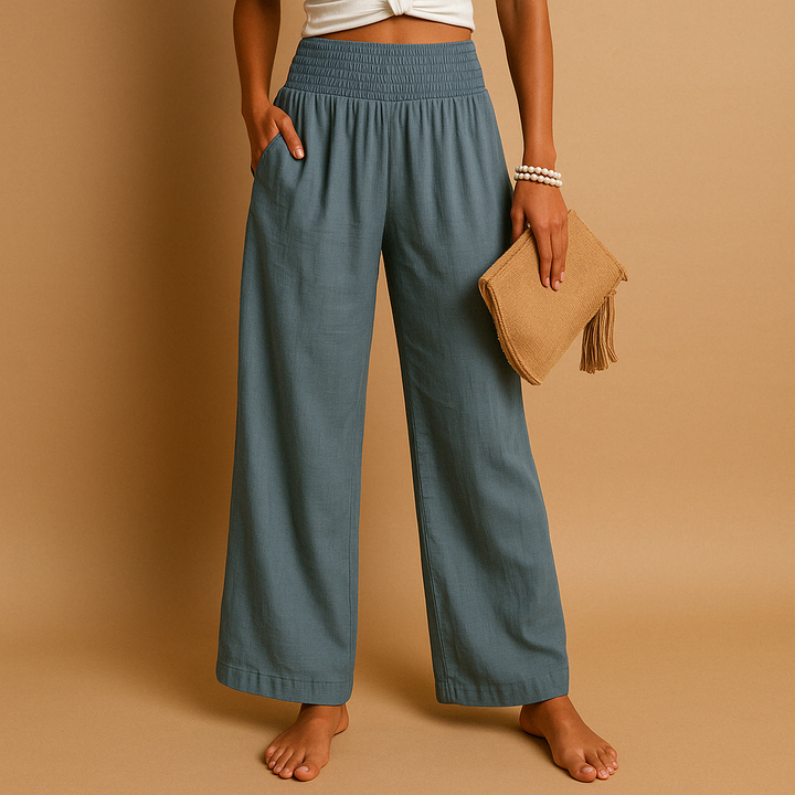 Women's casual lightweight summer trousers featuring an elastic waist & loose fit. Breathable & comfy for warm weather.