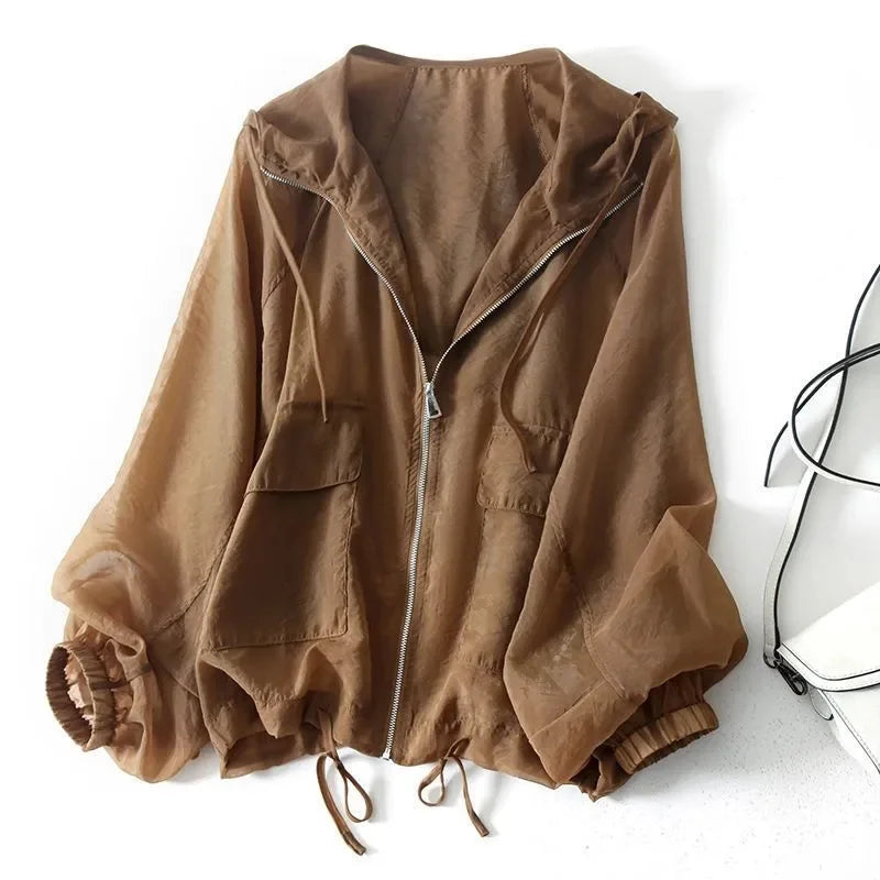Women's lightweight zip-up hoodie for summer sun protection, quick-dry fabric, ideal for outdoor activities & travel.