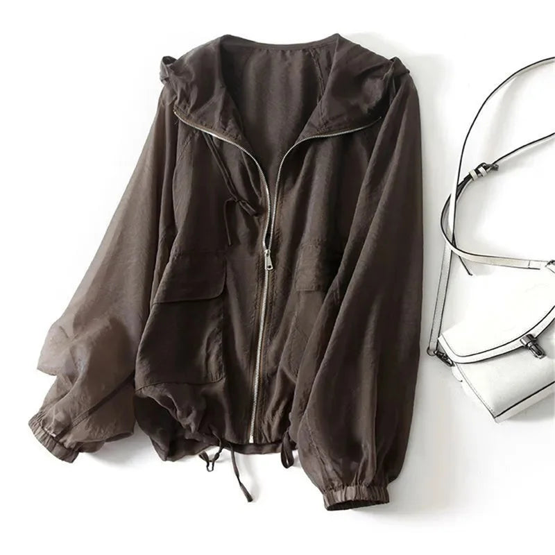 Quick-dry women's sun protection hoodie, lightweight summer wear for hiking, beach, and outdoor adventures.
