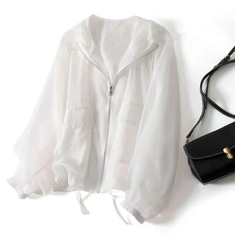 Women's lightweight sunscreen hoodie, provides UPF sun protection for summer comfort during travel & casual wear.