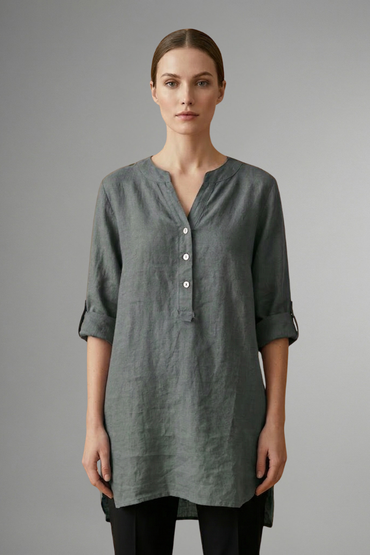 Chic V-neck linen blouse for women, button-up design, practical roll sleeves. Loose casual fit for summer style.