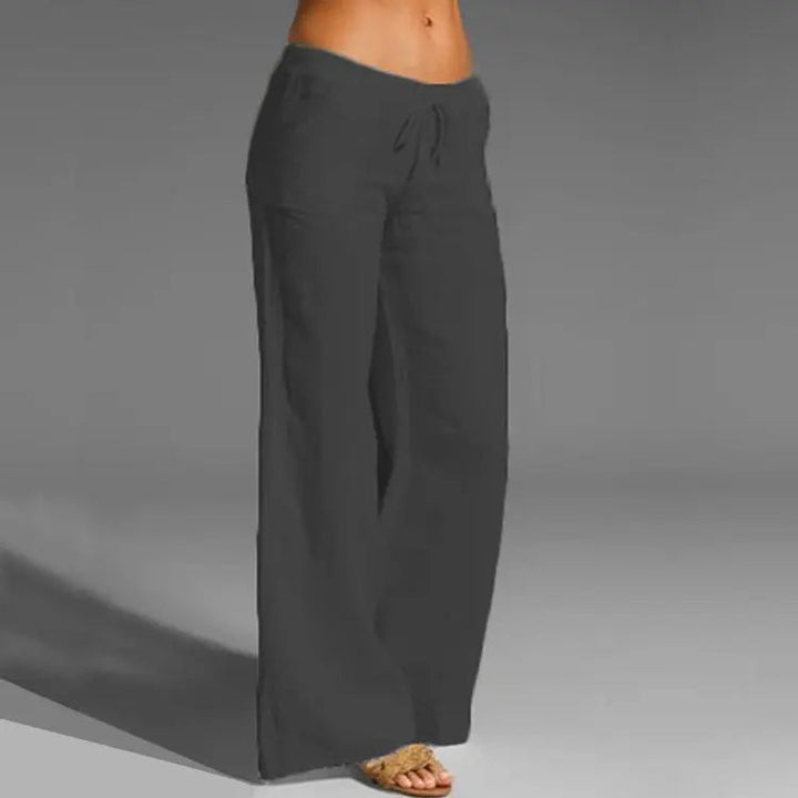 Breathable women's linen summer trousers, perfect casual bottoms for warm days.