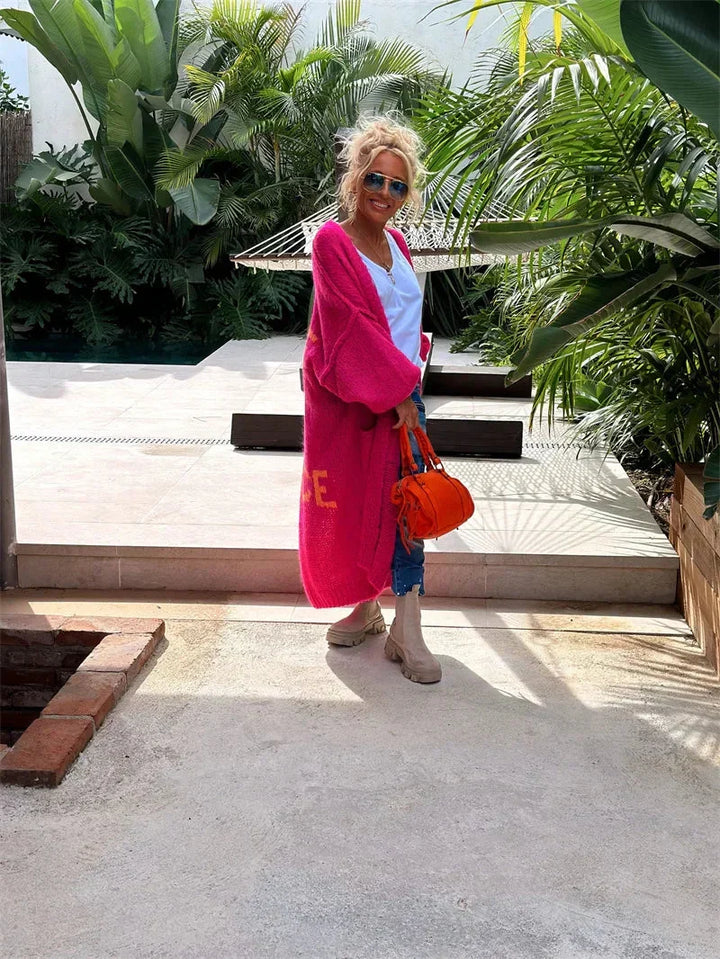 Stylish women's long oversized bohemian knit cardigan, offering a relaxed, comfortable fit.