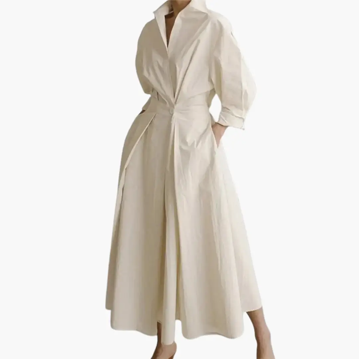 Women's long shirt dress with defined waist & button front. Perfect for elegant casual wear.