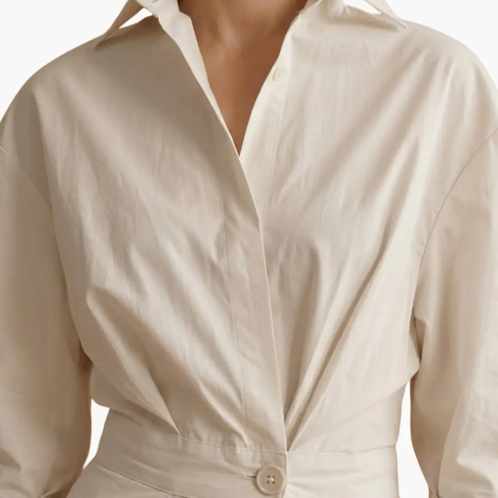 Flattering women's long shirt dress. Defined waist, button front. Ideal for a polished casual look.