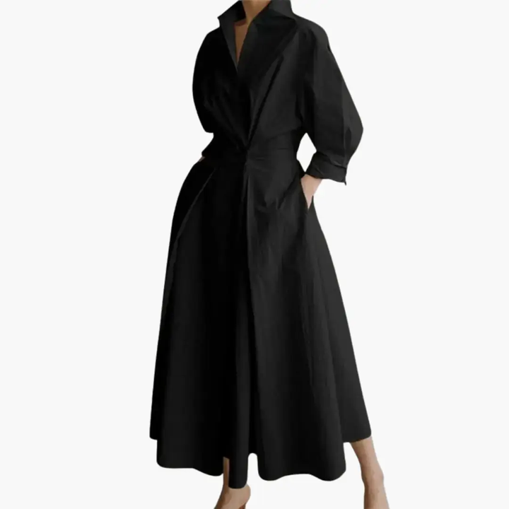 Chic women's long sleeve button-front maxi dress. Defined waist for a stylish silhouette.