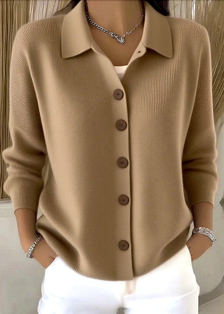 Comfortable women's knit cardigan featuring a button-down front & classic shirt collar, ideal for all-season layering.