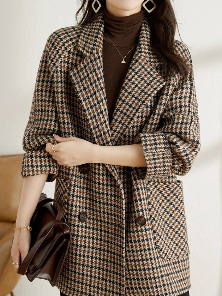 Patterned women's blazer jacket with classic plaid print, ideal for spring fashion and versatile styling.