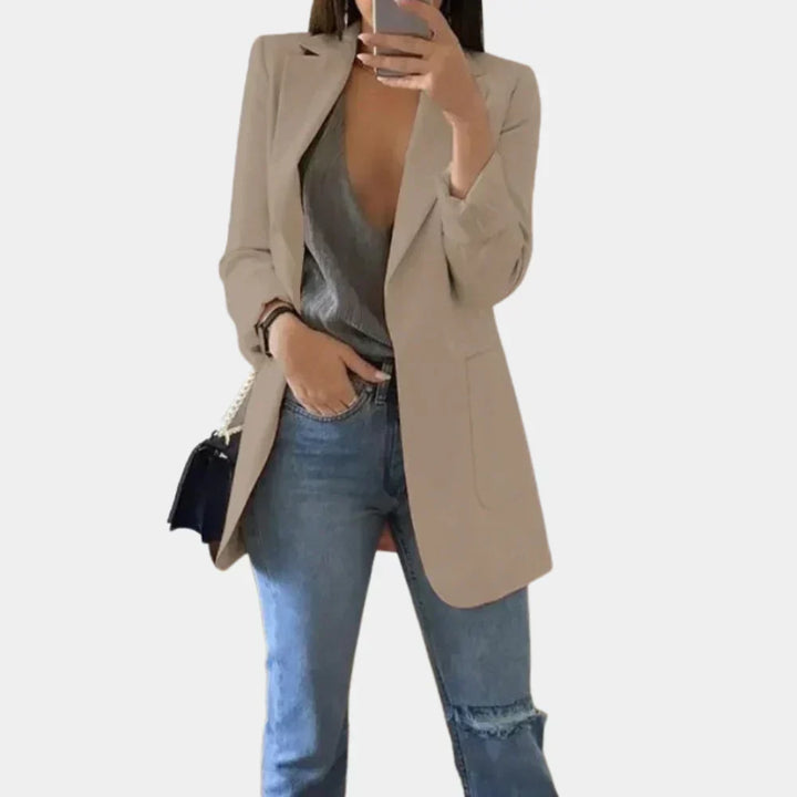 Elegant women's long slim fit blazer. A versatile modern style jacket for professional and business casual outfits.