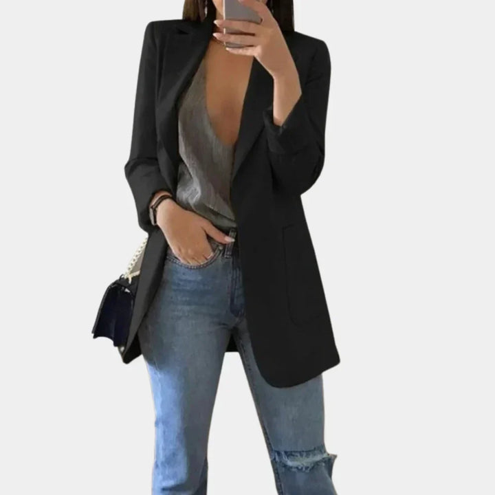 Versatile women's long blazer with a modern slim fit, great for business wear, office attire, or stylish casual outfits.