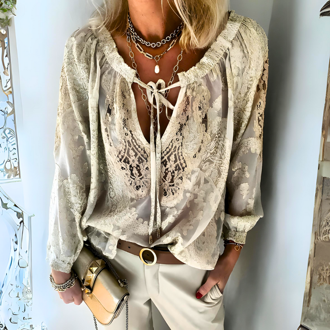 Women's loose-fit bohemian artisan blouse, perfect for summer fashion and casual wear.