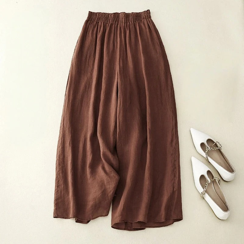 Women's loose fit trousers with a relaxed waistband, offering comfortable & versatile style for everyday wear.