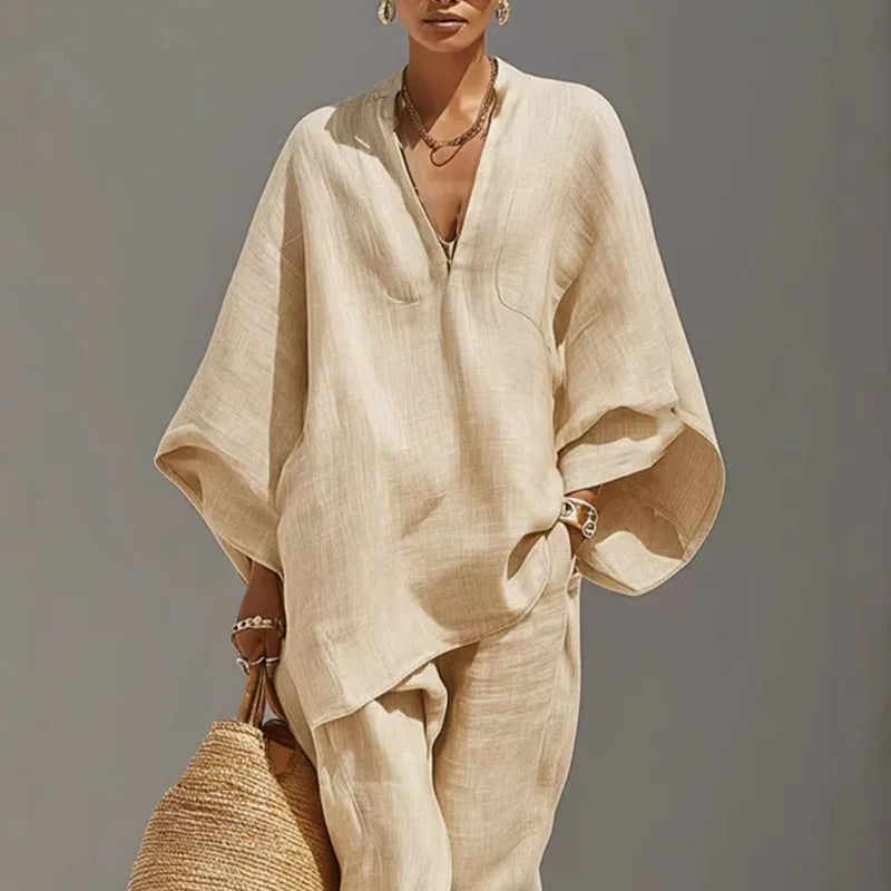 Women's loose linen blend matching set with batwing top & tapered pants, perfect for casual summer wear.