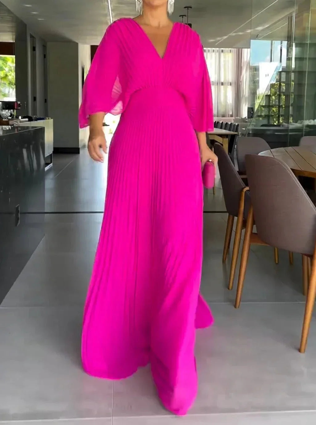 Stylish V-neck pleated maxi kaftan dress for women, with a graceful flow for elegant summer occasions.