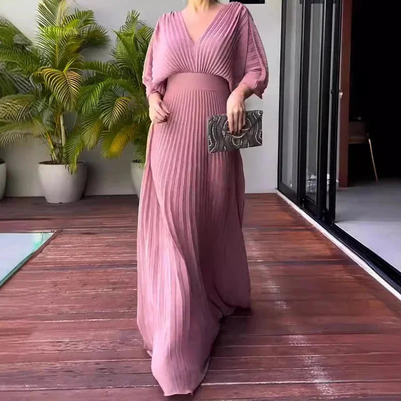 Elegant women's V-neck pleated kaftan maxi dress. Comfortable, flowy, and perfect for summer wear.
