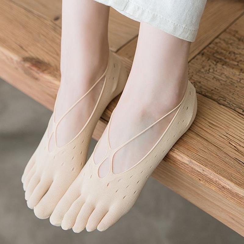 Close-up of a single women's toe sock, highlighting the individual toe compartments and low-cut design.