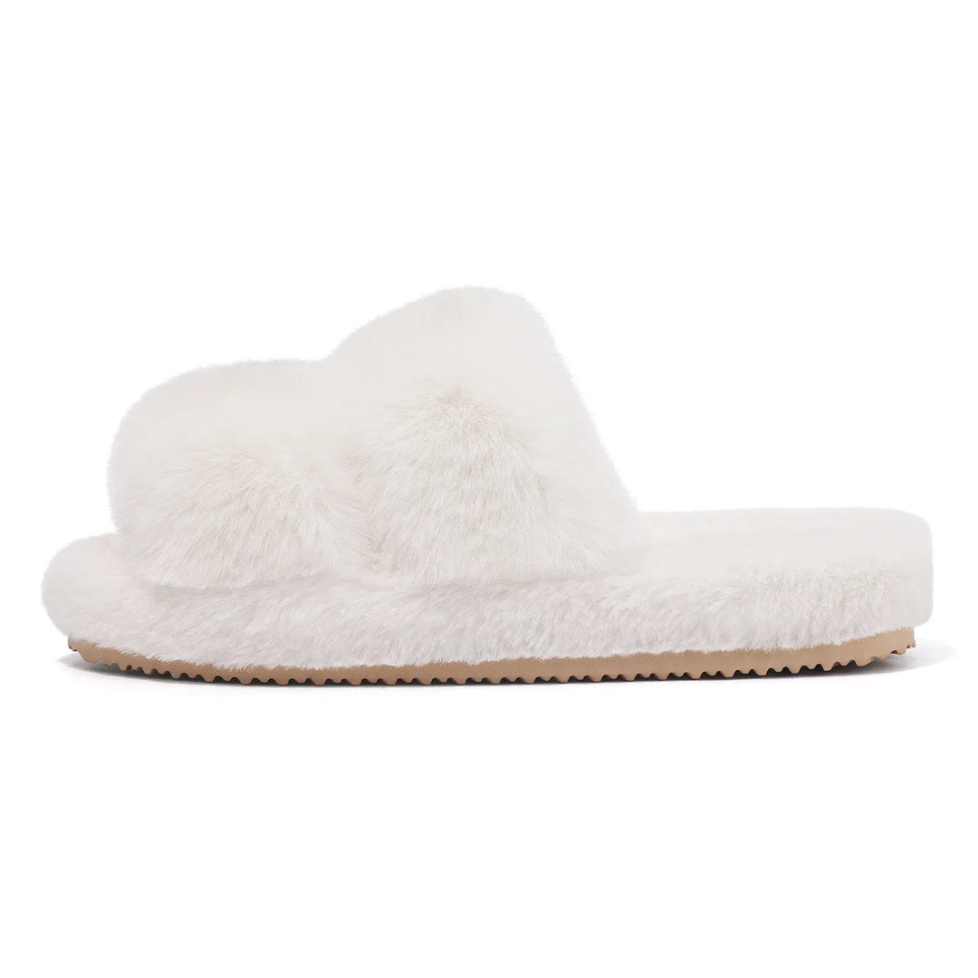 Women's faux fur slides, designed for ultimate comfort and warmth, a perfect addition to any homewear collection.