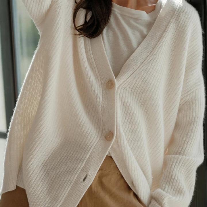 Luxury women's open front cardigan, long sleeve, versatile winter layering.