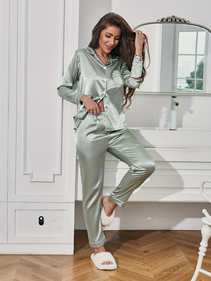 Close-up of the smooth, luxurious silky fabric of a women's two-piece pajama set for ultimate comfort.