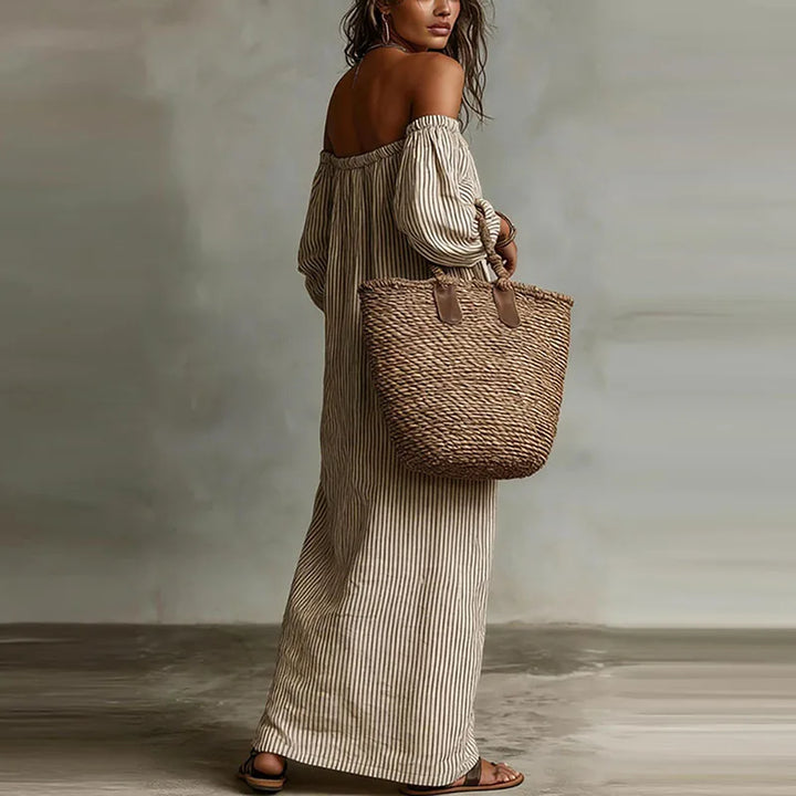 Comfortable Madison off-shoulder midi dress, a stylish addition to any woman's summer wardrobe.